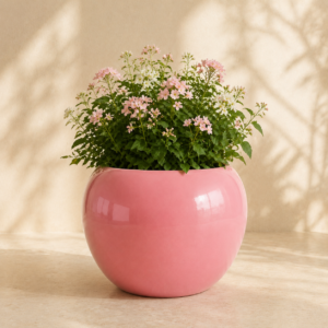bubblegum pink round planter with flowers